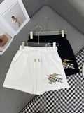 COTTON SHORTS WITH SIGNATURE EMBROIDERYmen's pants